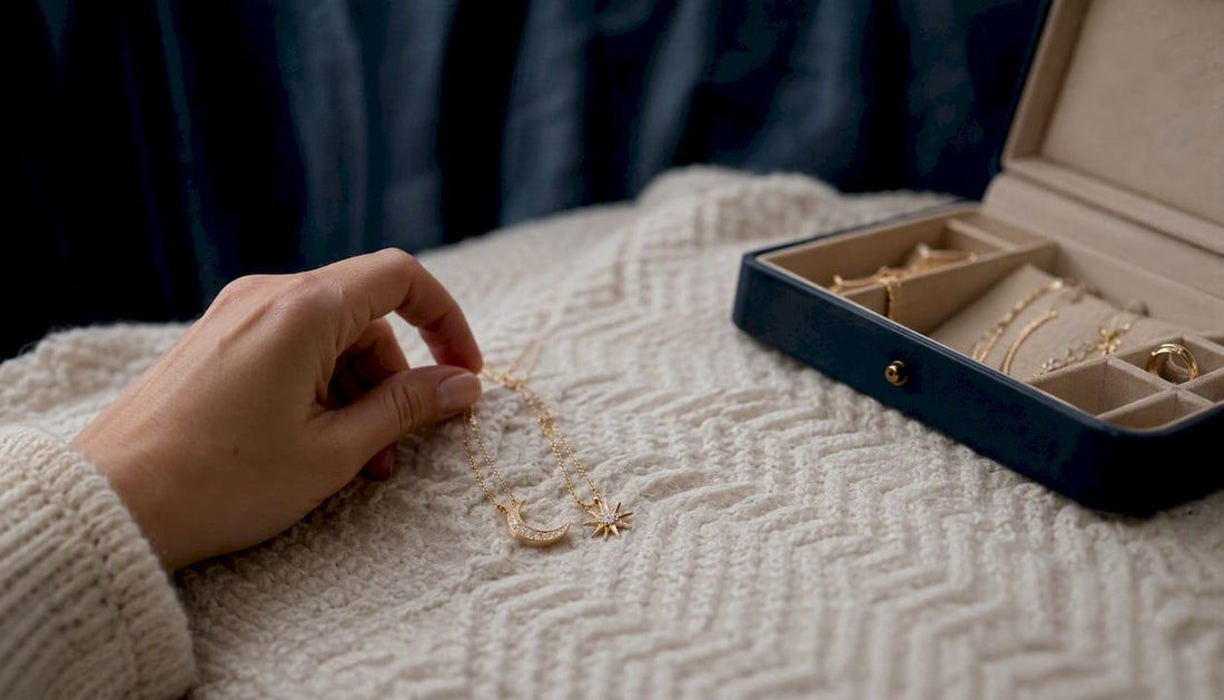 Hand placing friendship necklaces on linen cloth