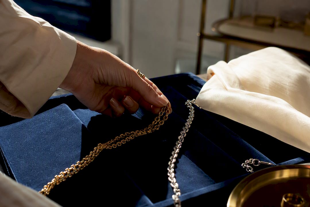 Mixed gold and silver jewelry styled editorially